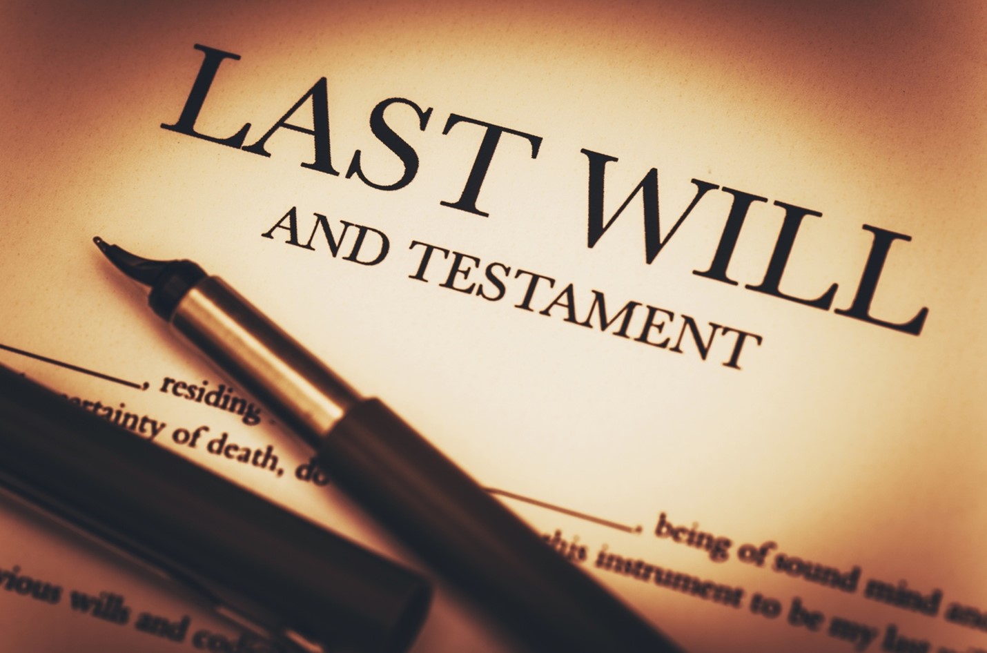 last will and testament with a pen on it